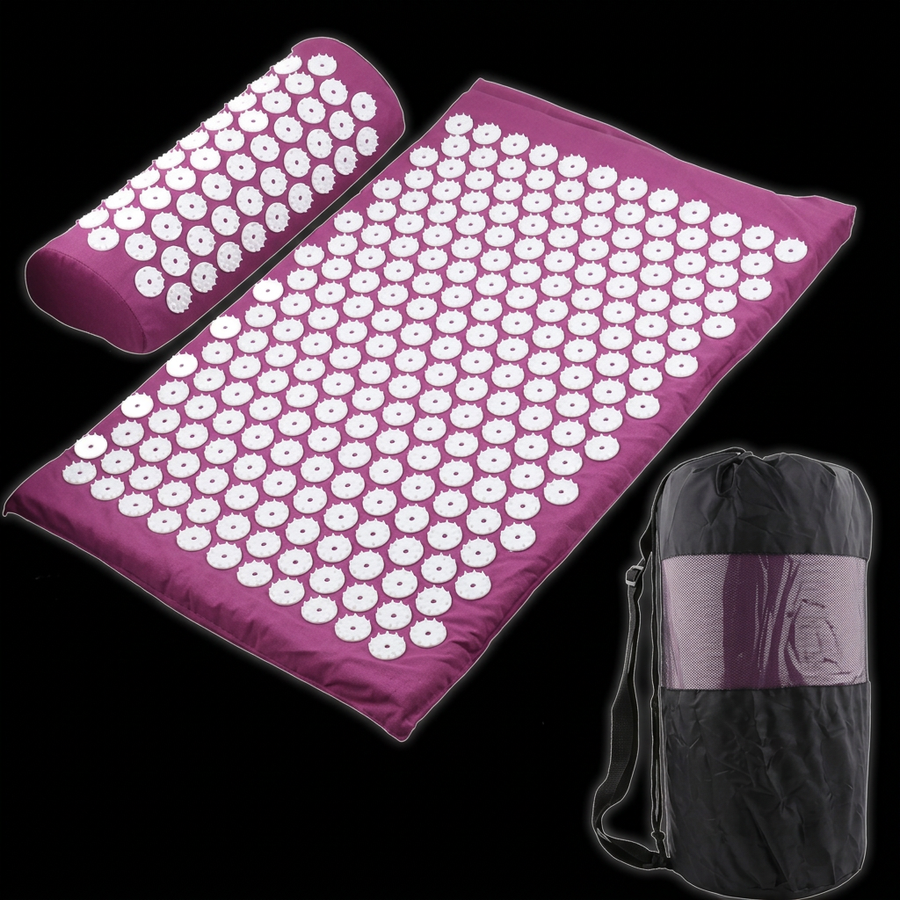 Purple acupressure mat, pillow and carry bag on black with white edge lighting
